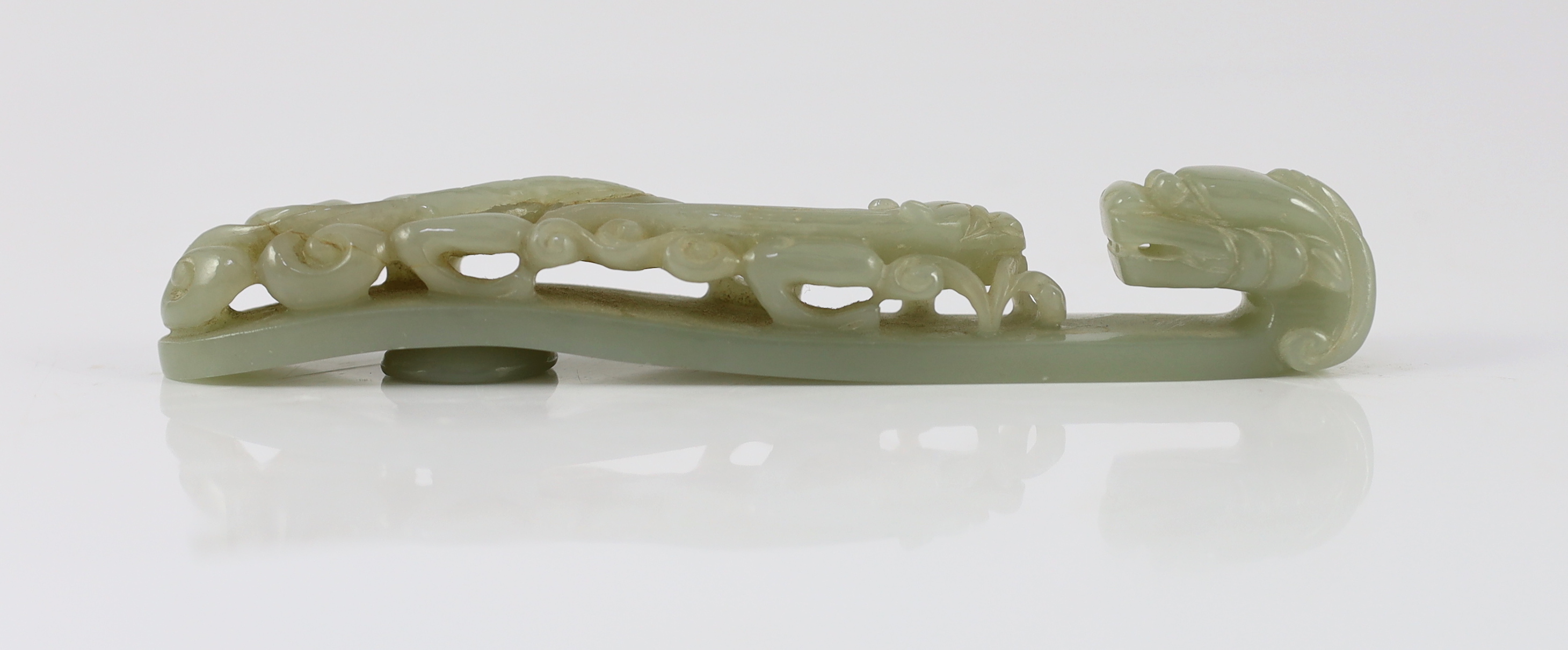 A large Chinese pale celadon jade ‘dragon’ belt hook, 18th/19th century